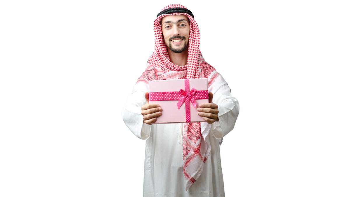 arab man giving gift