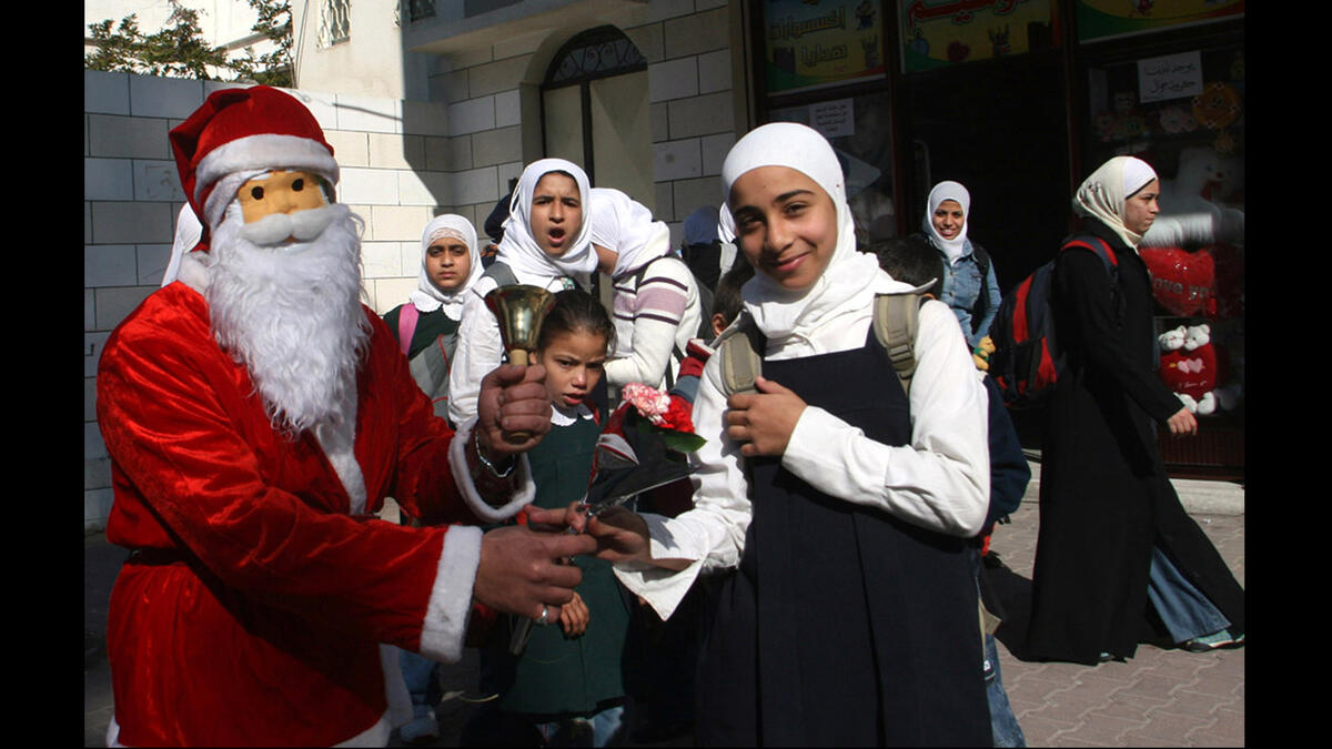 Santa Clauses hand out candy to children in the Old City, while Manger Square becomes a din of traditional musical performances and folkloric shows. The streets are abuzz with bands playing bagpipes -- a ritual that dates back to the days of the British Mandate (1920-1948), according to Anadolu Agency.