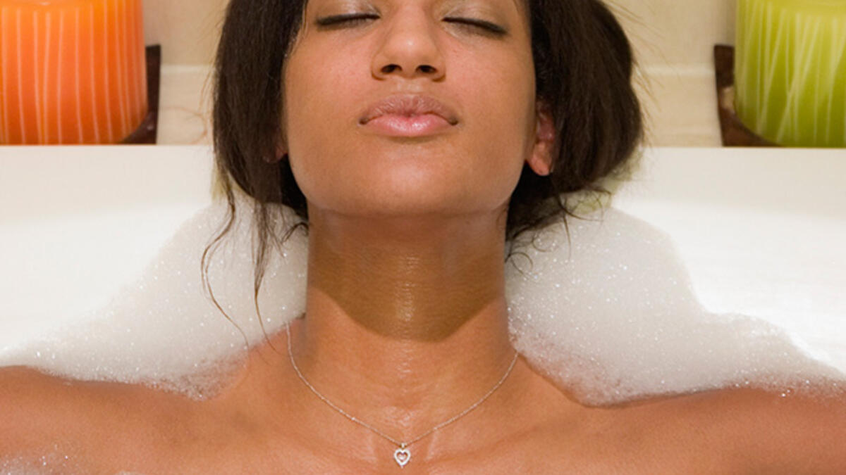 Avoid cold showers! Insane-sounding advice on days when you could fry falafel on your skin, but it is much smarter to enjoy a lukewarm shower or tepid tub soak before bed because a cold shock to the skin will prompt your body to overproduce heat once you dry off. Biology can be so cold!