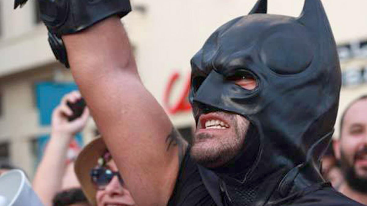 beirut protester dressed as batman