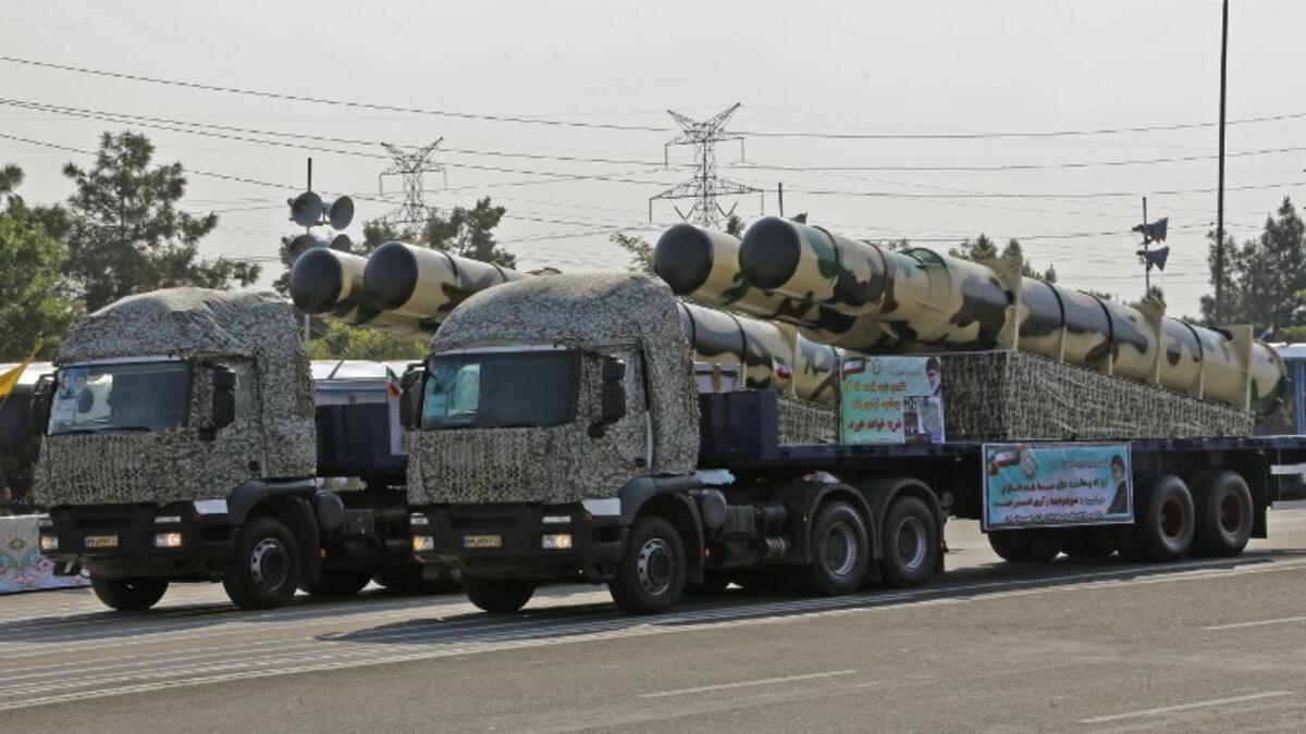 A military truck carries missiles during the military parade on Iran's Army Day on April 18, 2018 in Tehran. ATTA KENARE / AFP