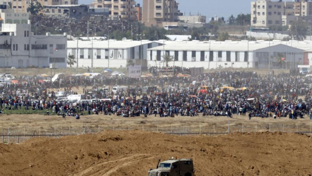 Tens of thousands protested and clashes erupted along the Gaza border against the US transfer of its embassy to Jerusalem, after months of global outcry, Palestinian anger and exuberant praise from Israelis over President Donald Trump's decision tossing aside decades of precedent. JACK GUEZ / AFP