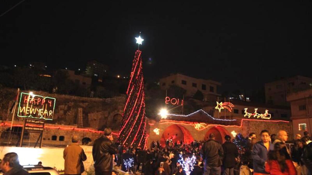 Fuheis is usually at the heart of Jordanian Christmas celebrations, but this year its planned seasonal events have been abandoned following Sunday’s deadly shootings in Karak. Elsewhere in the Kingdom, Madaba and al-Hussen's Christmas trees, planned to be lit up later this week, will instead remain darkened in mourning for the ten Karak victims.