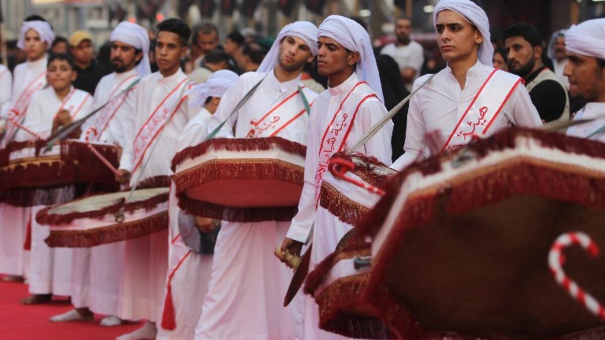Shiite pilgrims take part in the preparations of the Ashura ceremony in Karbala, about 80 kilometres (50 miles) southwest of Baghdad on September 18, 2018. AHMAD AL-RUBAYE / AFP
