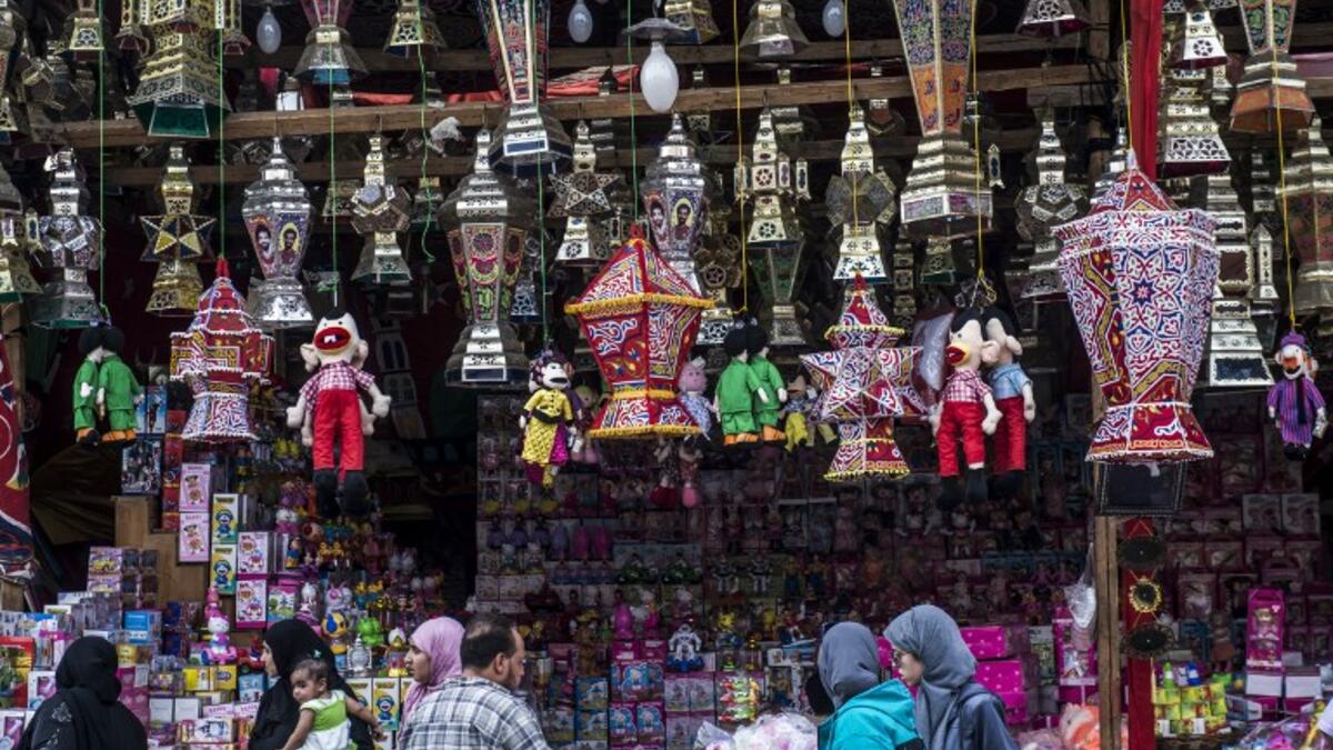 Ramadan lantern bearing the image of Liverpool's Egyptian midfielder Mohamed Salah hanging on sale at a market in the capital Cairo's central Sayyida Zeinab district as people are preparing to enjoy the 'Holy Month'.
KHALED DESOUKI / AFP