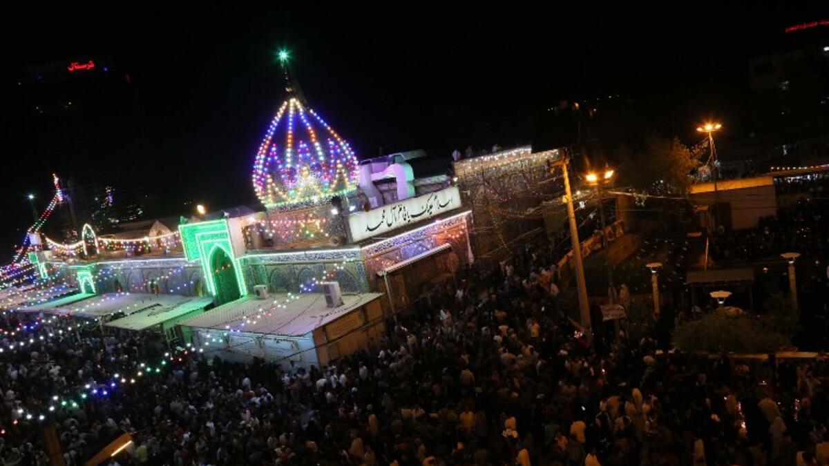 Pilgrims gather outside of the Imam al-Mahdi shrine during the Shaabaniya ceremony commemorating the Imam's birth, in the central Iraqi city of Karbala, on May 2, 2018. the event comes two weeks before the start of the holy fasting month of Ramadan.
Mohammed SAWAF / AFP