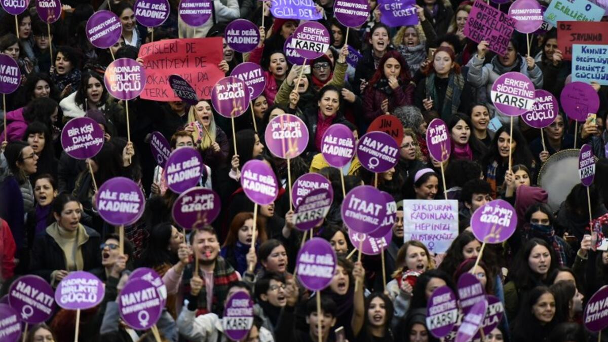 Women's rights activists gather to march through Taksim Square to protest against gender violence in Istanbul, on November 25, 2018, on the International Day for the Elimination of Violence against Women. 
Yasin AKGUL / AFP
