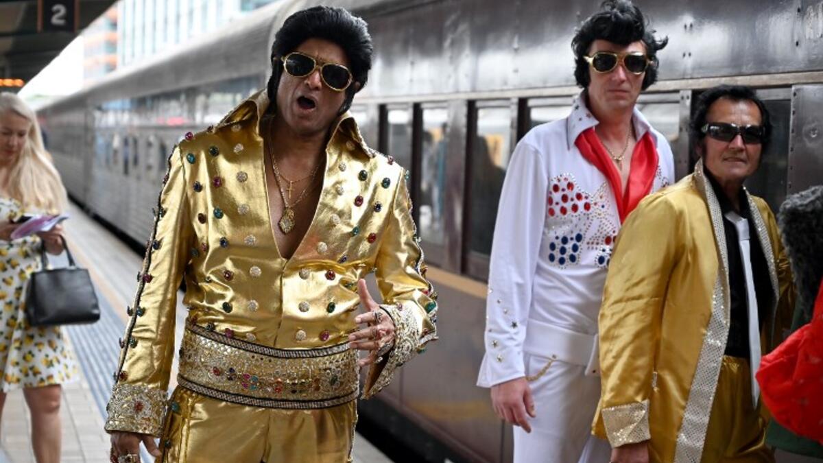 Elvis fans arrive at Central station before boarding a train to The Parkes Elvis Festival, in Sydney on January 10, 2019. The Parkes Elvis Festival is an annual event celebrating the music and life of Elvis Presley in the New South Wales town of Parkes.
PETER PARKS / AFP