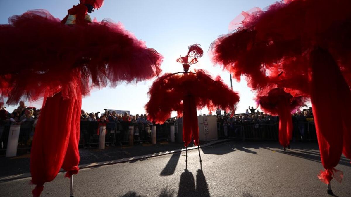 Artists take part in the Nice Carnival parade in Nice, southeastern France, on February 16, 2019. The 135th carnival runs from February 16 to March 2, 2019 and celebrates this year the "King of Cinema". 
VALERY HACHE / AFP