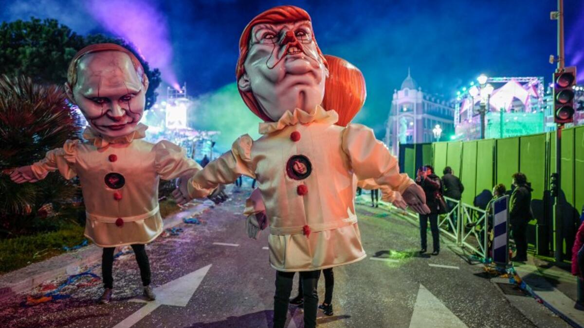 Statues depicting US President Donald Trump and Russia's Vladimir Putin as evil clowns parade on the first day of the 135th Nice Carnival which runs until March 2 under the theme "King of Cinema," on February 16, 2019 in Nice.
VALERY HACHE / AFP