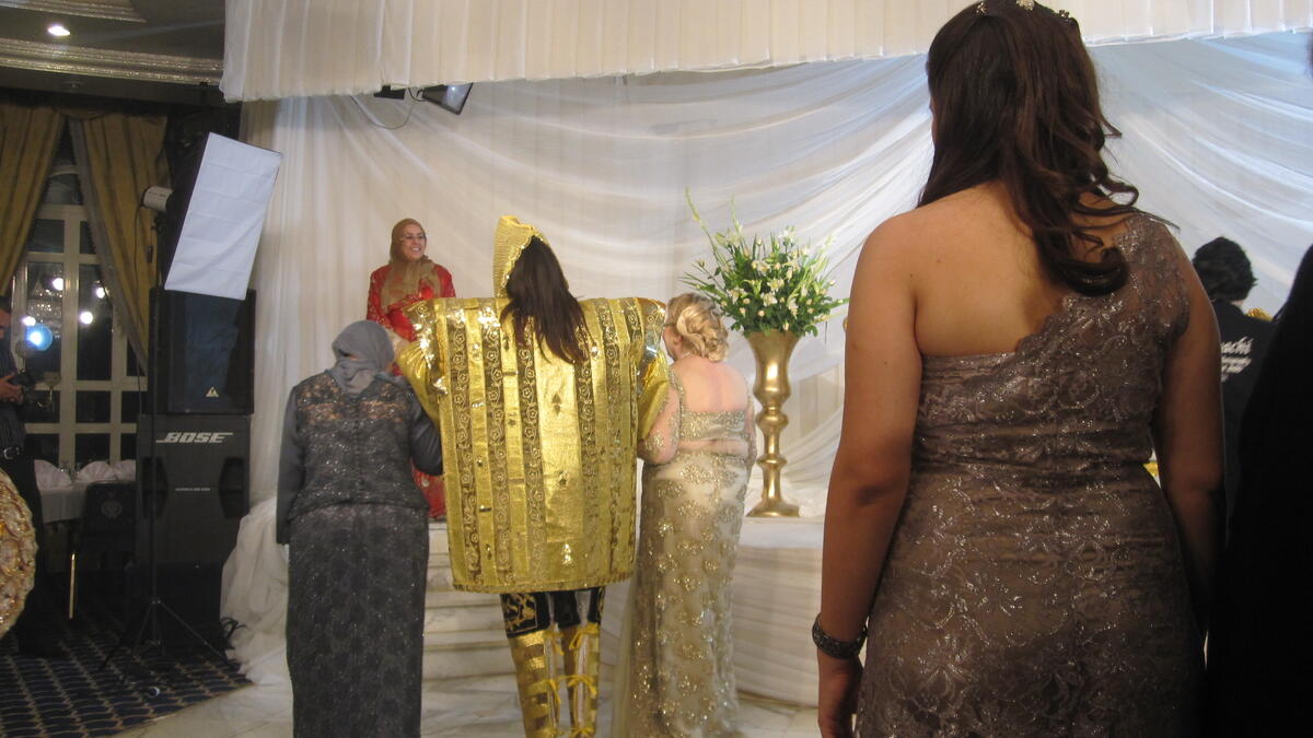 Step on fish, Tunisia: This ritual is very common among the people of the city of Sfax. A big fish, decorated with colorful strings, is brought to the couple on a dish. The groom holds his bride's hand as she takes seven steps on the fish, then they switch roles. (erinegold.files.wordpress.com)