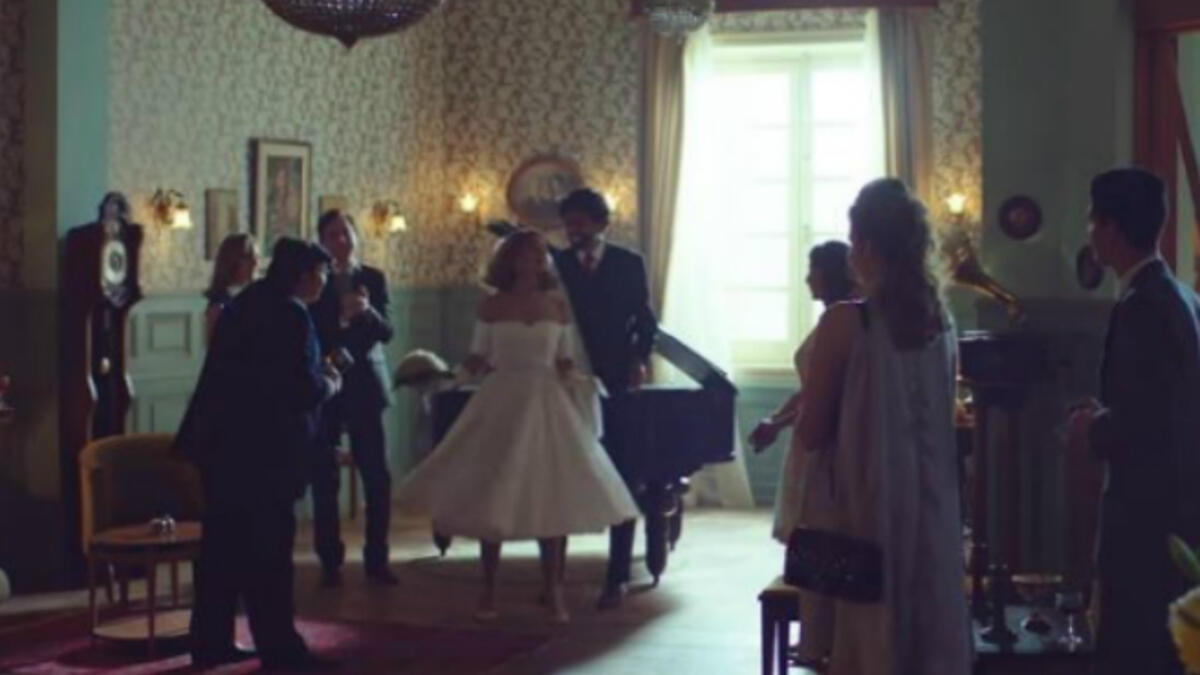 Egyptian Russian Actress Nelly Karim slipped into a wedding dress that suits the sixties which is the era