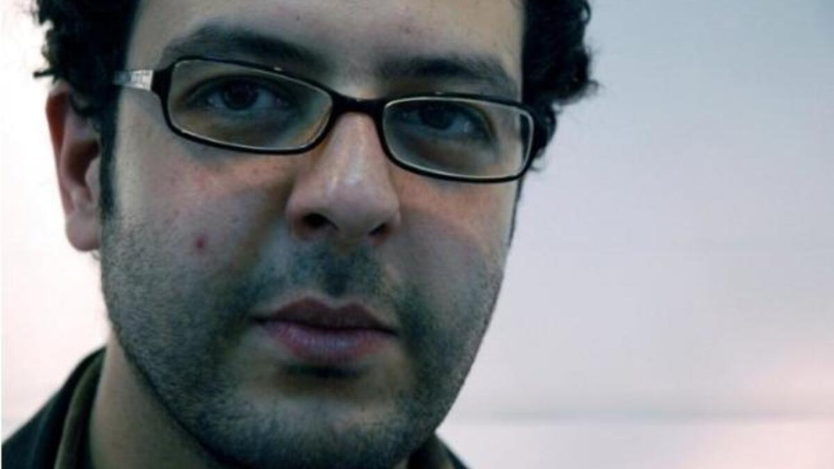 Artsy poster boy: Ahmad Bassiouny 32 year-old father of two was found at a hospital, choked with gas and with rubber bullet wounds with fractures all over. An assistant professor of Art at Helwan Uni, was seized as he videoed 
protests in January, and died January 28th before Mubarak's ousting.