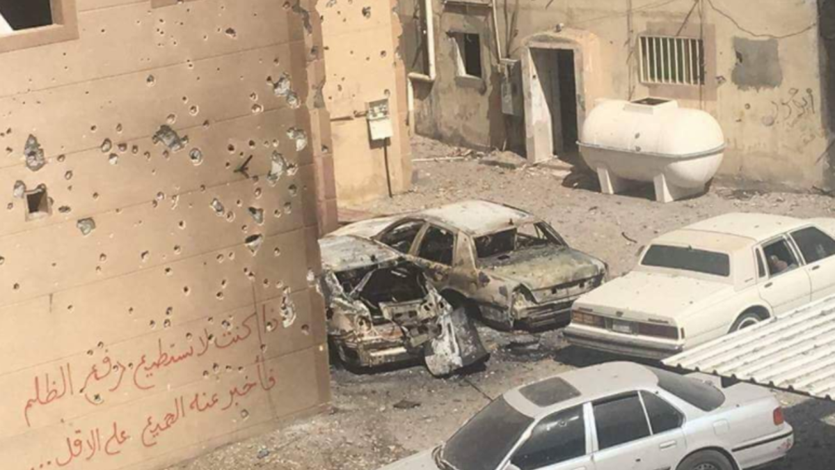 The graffiti shown here on the bullet-ridden wall reads: "If you are unable to stop the oppression, then at least tell everyone about it."

(Source: Twitter @AngryQatifi)