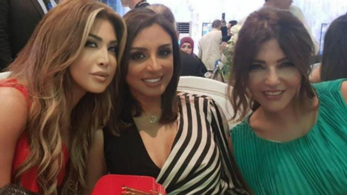 Nawal Al Zoghbi posted a picture with Egyptian star Angham and Morrocan Diva Samira Said captioning it "Love you"