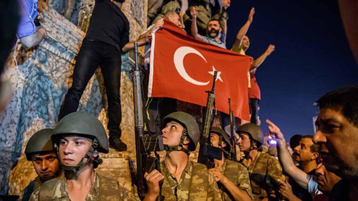 A failed coup: Turkish soldiers pose with a flag at Istanbul’s Taksim Square during an unsuccessful bid to topple the government of Recep Tayyip Erdogan.