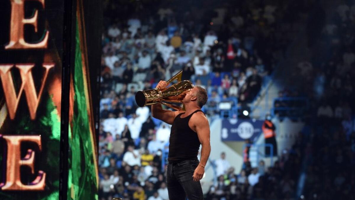 Shane McMahon, SmackDown commissioner and minority owner of WWE, raises the WWE World Cup trophy following the match as part of as part of the World Wrestling Entertainment (WWE) Crown Jewel pay-per-view at the King Saud University Stadium in Riyadh on November 2, 2018.
Fayez Nureldine / AFP