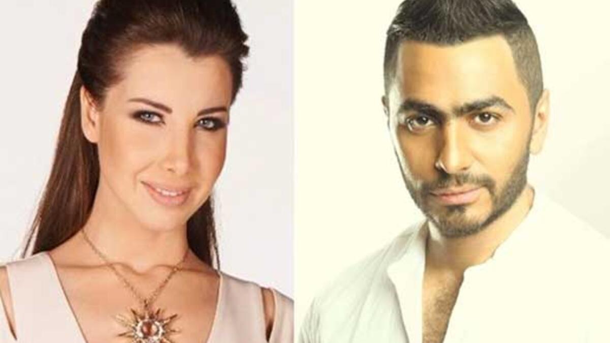 الفنان تامر حسني والفنانة نانسي عجرم