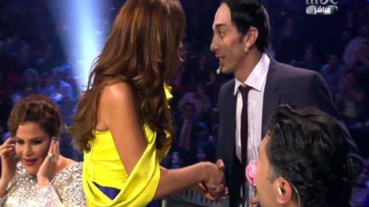 الأردني أسعد الأسعد مع نجوى كرم في عرب أيدول