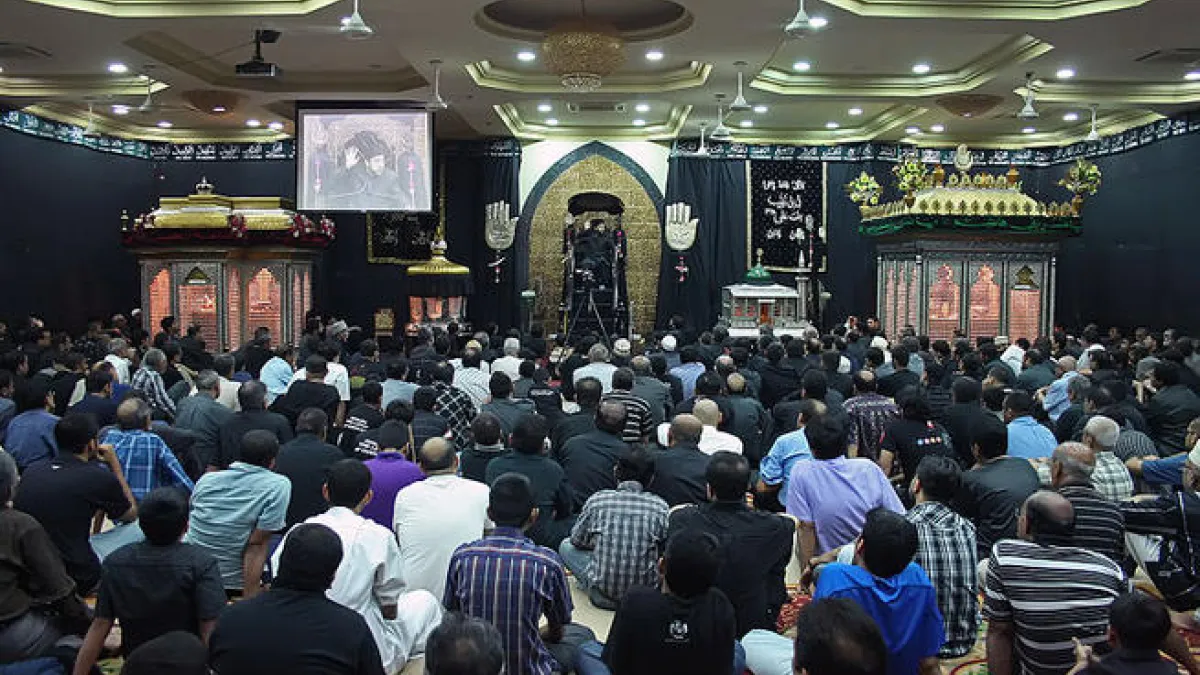 Ashura, aside from the general sombre tone to the day, is actively made up of mourning rituals and passion plays re-enacting
the historical martyrdom and suffering. While centered in the more widely recognized, high profile outdoor parades, there is also
activity in indoor congregation halls known as Hussainia (pictured).