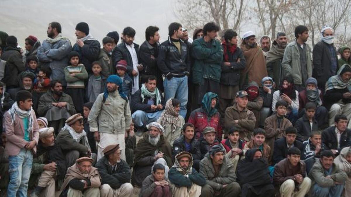 Afghans spectate during the weekly dog fights.