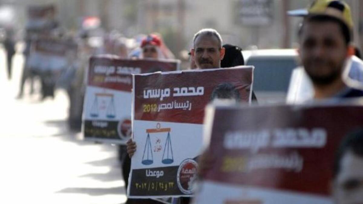 Human chain links in for Egypt's elections Poster Frenzy