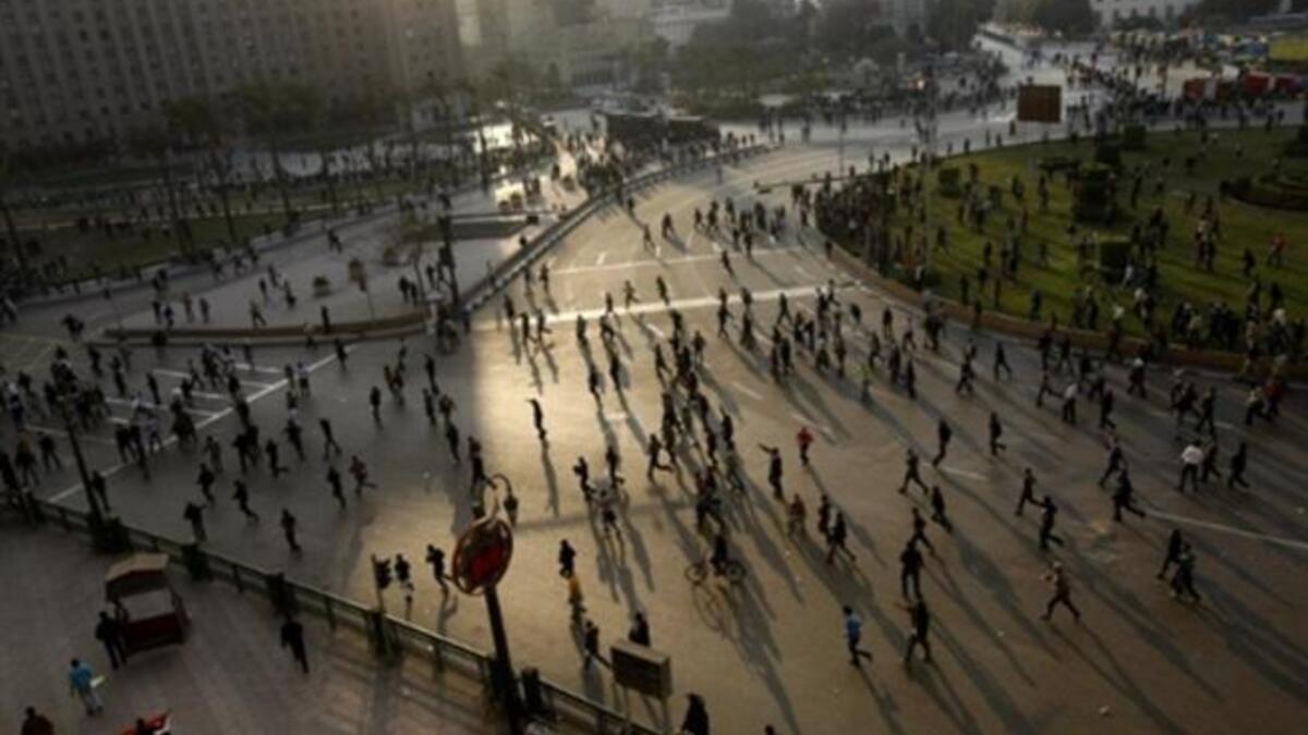 The protesters, carrying flags and chanting slogans against the government.
