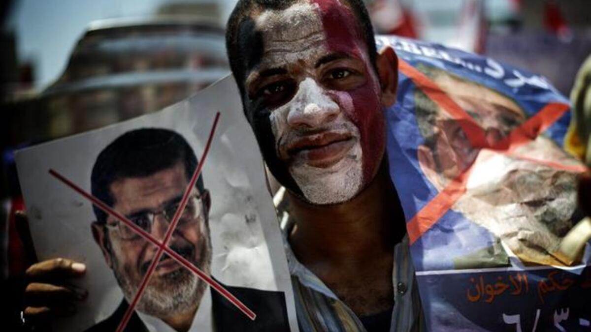 He'd probably paint that X right across Morsi's face if he had the chance (AFP)