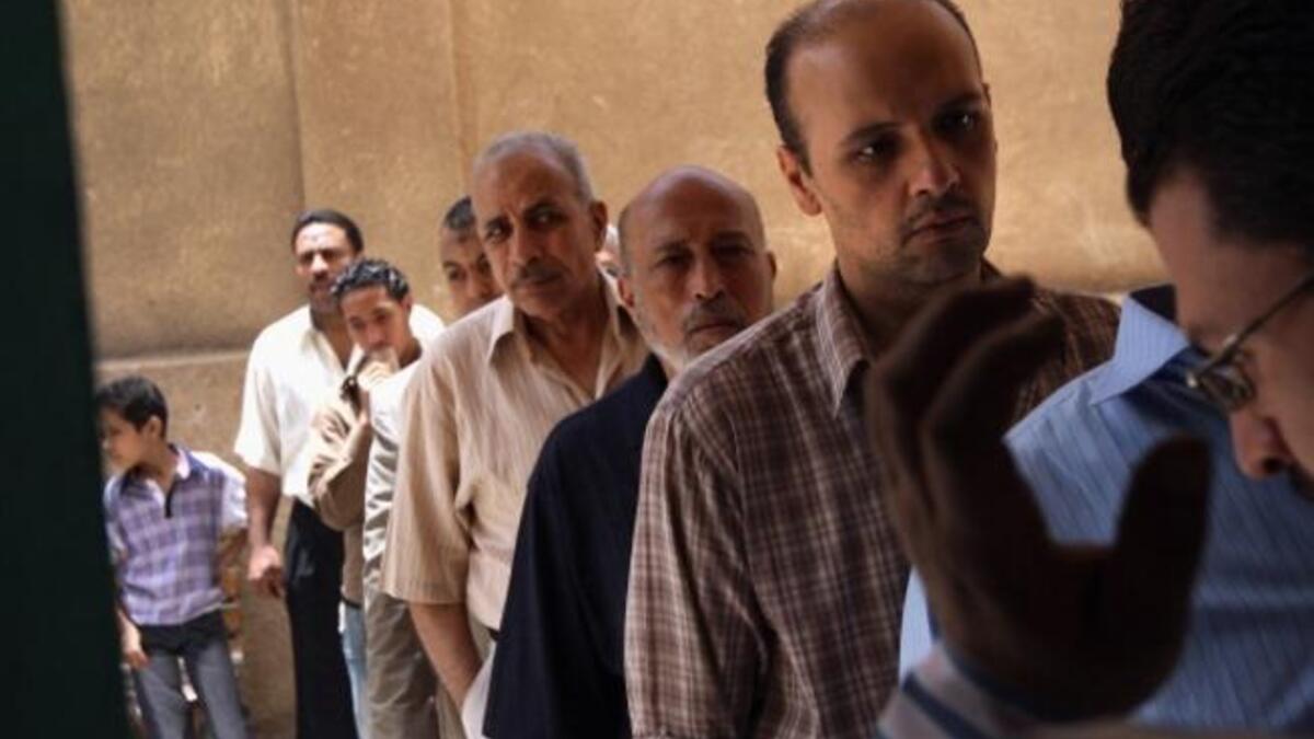 Voters queue at polling stations to elect Egypt's President