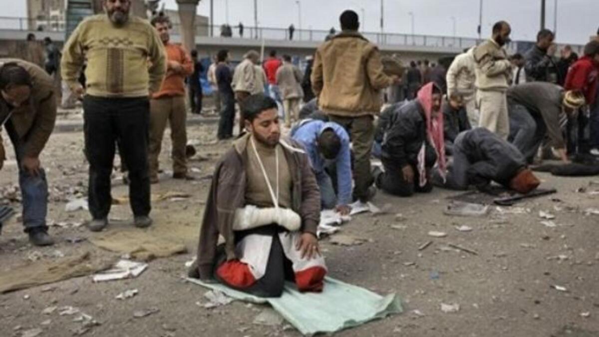 Broken arm, but the faith and endurance do not seem to waver.