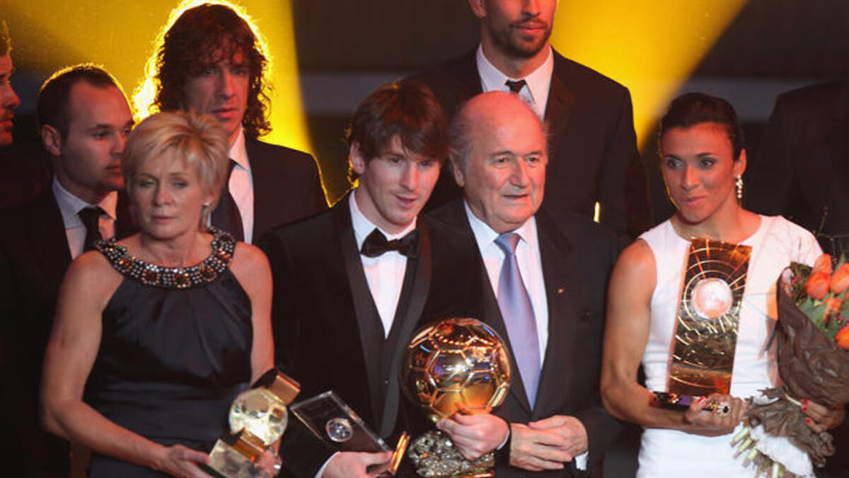 Silvia Neid (L) of Germany winner of women's coach of the year, Lionel Messi (2nd L) of Argentina winner of the men's player of the year,FIFA President Sepp Blatter (2nd R) and Marta (R) of Brazil winner of the women's player of the year.