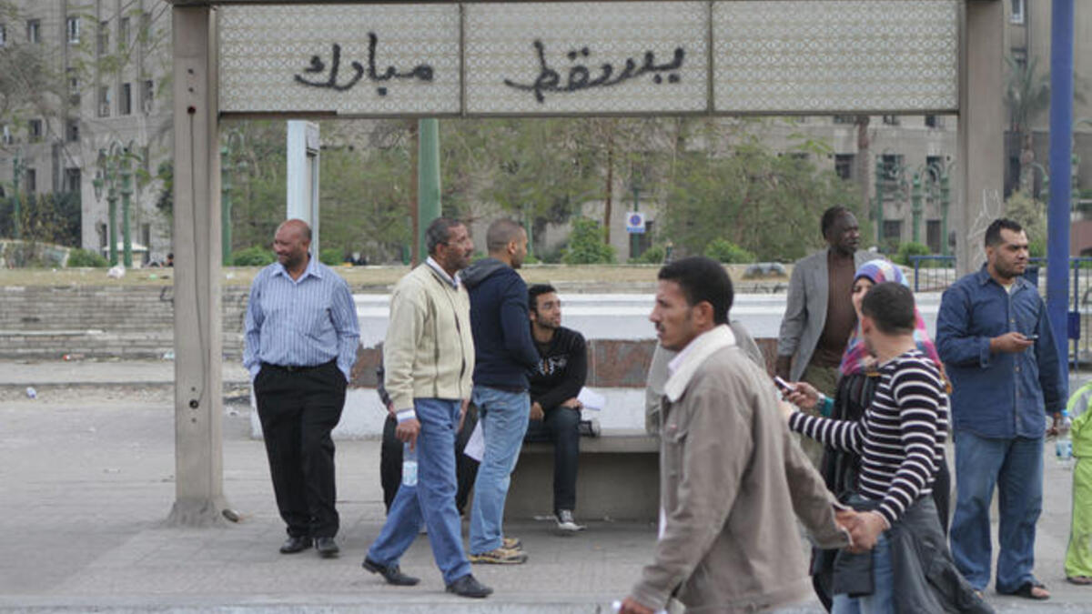 "Down with Mubarak".