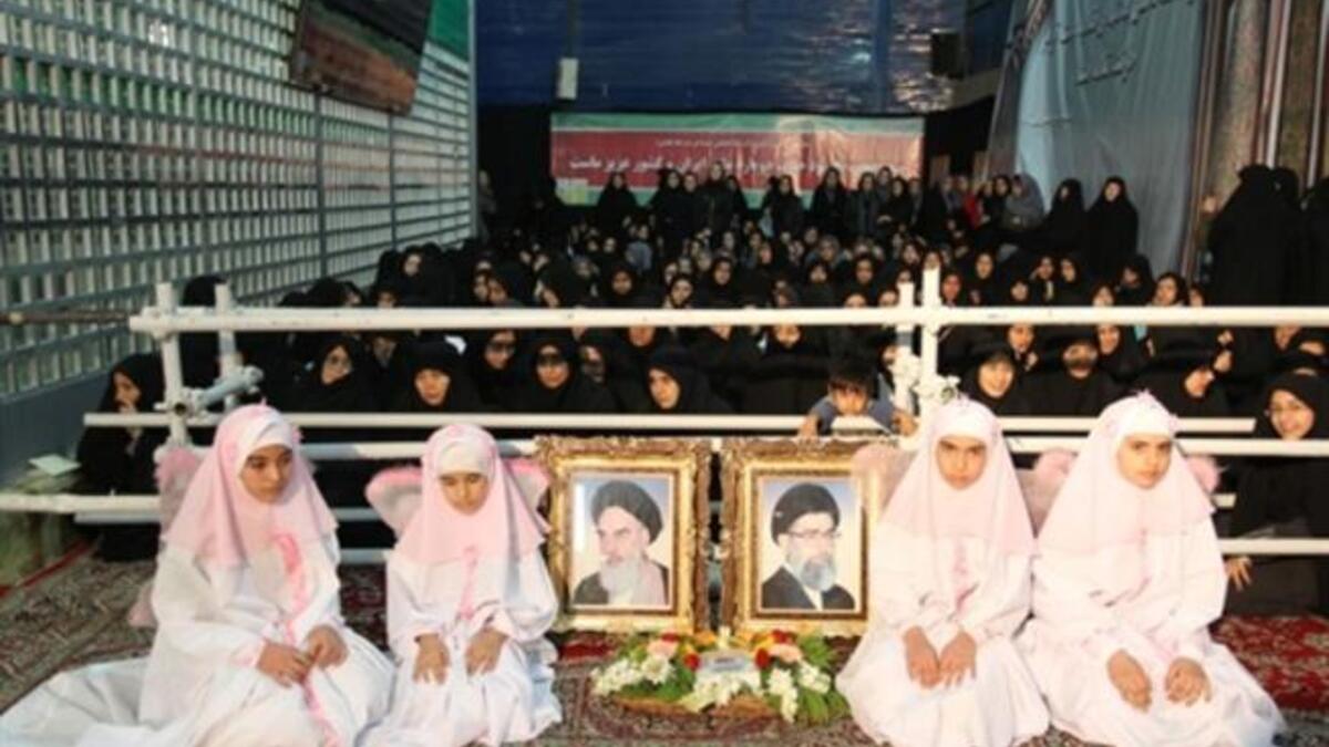 Iranian women gather during the ceremony.