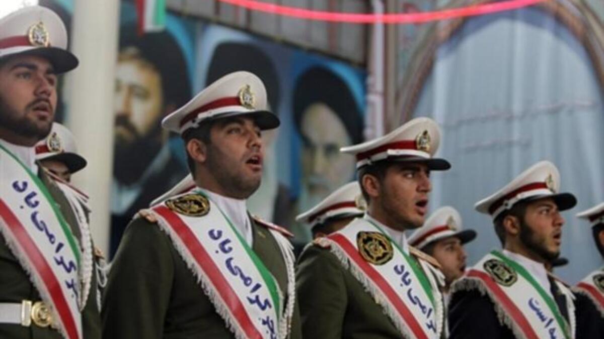 Bells chimed across Iran to mark the return from exile in 1979 of Ayatollah Ruhollah Khomeini, the trigger for a revolution which spawned an Islamic state now engulfed in a deep political crisis.