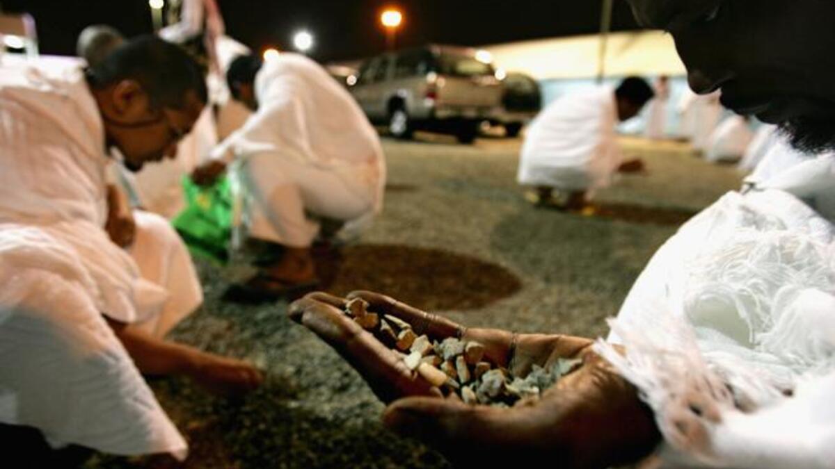 One leaves Arafat after sunset, reaching Muzdalifah by evening of 9th Dul-Hajj. Prayers are 
offered. The pilgrims spend the night, not before gathering together 49 or 70 small stones for use the next day.
 (Health & safety: bags of tiny pebbles or even gravel are sold to prevent injuries, together with safer fare-ways in place for positioning.)