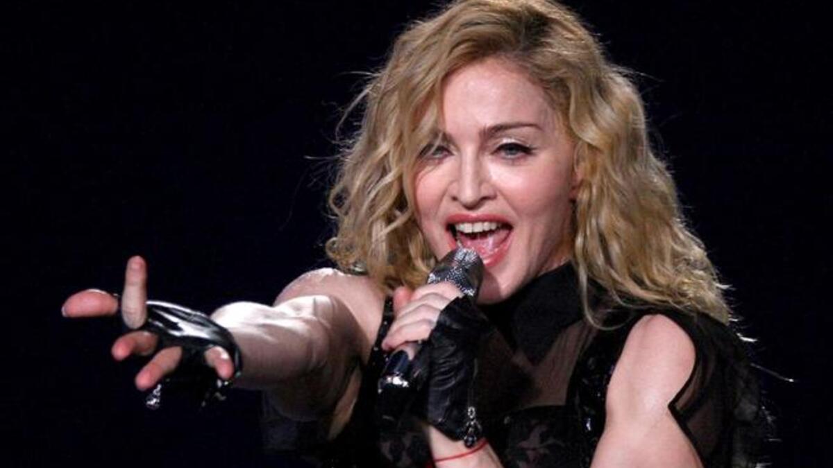 Madonna's muscley sinewy arms were the focus of MDNA
