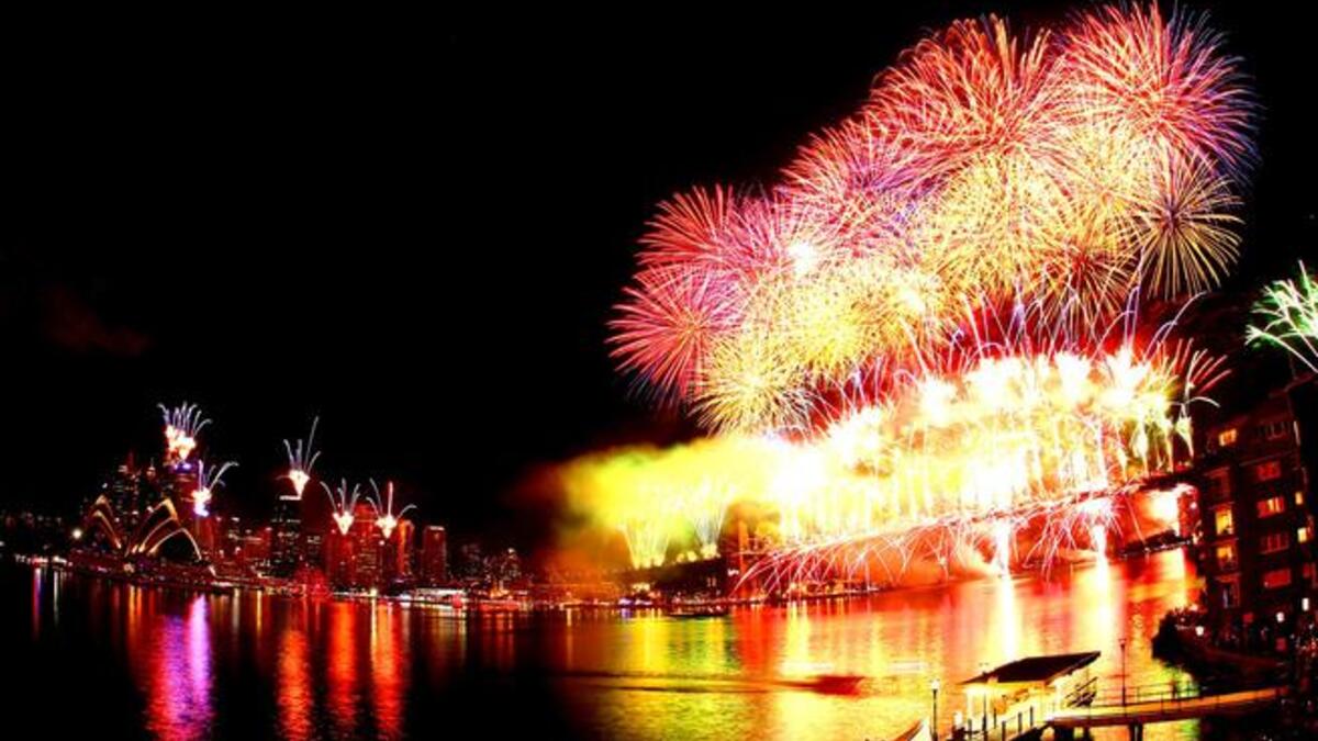Fireworks light up the skyline over Sydney Harbour during the midnight fireworks session as Sydney Celebrates New Year's Eve with the theme of ' A Time To Dream' in Sydney, Australia.