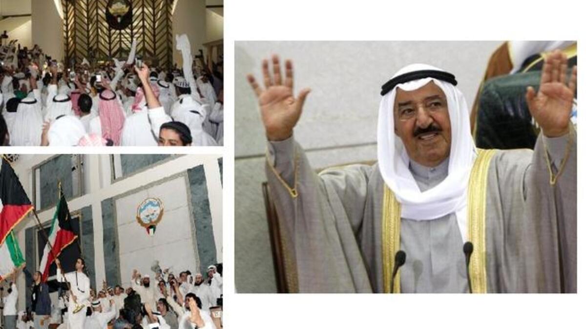Kuwaitis storm parliament, then reform their cabinet.
