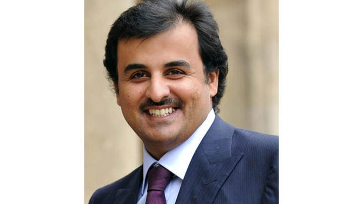 Sheikh Tamim Bin Hamad al-Thani arriving at the Elysee Palace for a lunch with French President Nicolas Sarkozy (AFP)