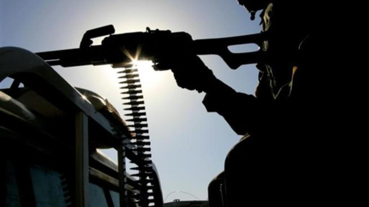 A UN peace keeper mans a machine gun as security remains tight.