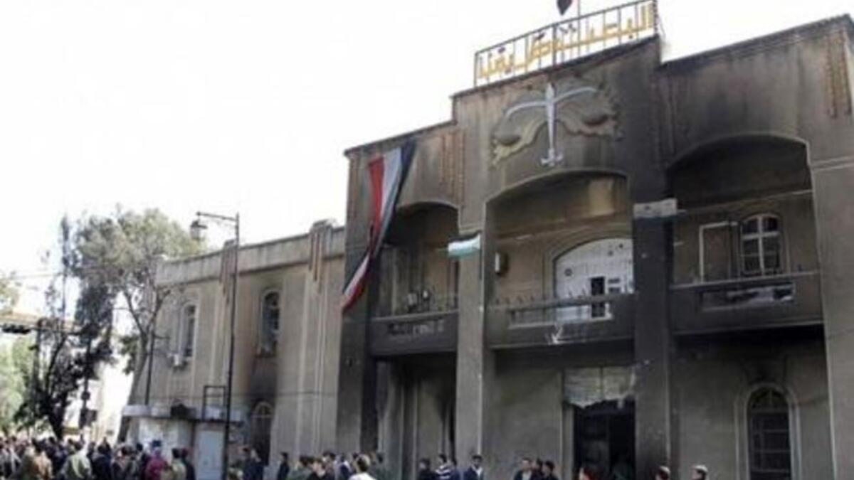 Crowds set fire to the headquarters of the ruling Baath Party in Deraa, chanting "No Baath party, no Assad. We want to liberate the country";  "No, no to emergency law. We are a people infatuated with freedom!"