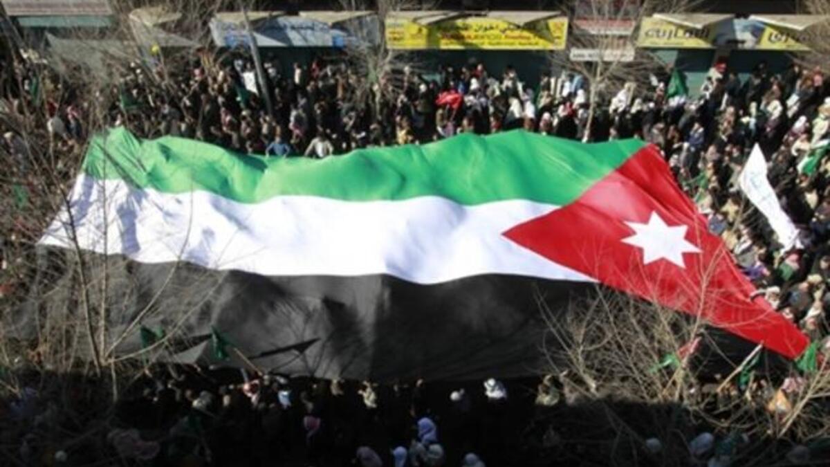 JORDAN: Thousands of Jordanian demonstrators attend a protest against Jordan's economic policies, demanding "bread and freedom" and that the government resign, January 21, 2011.