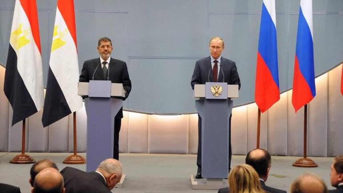 Morsi with Putin in Russia