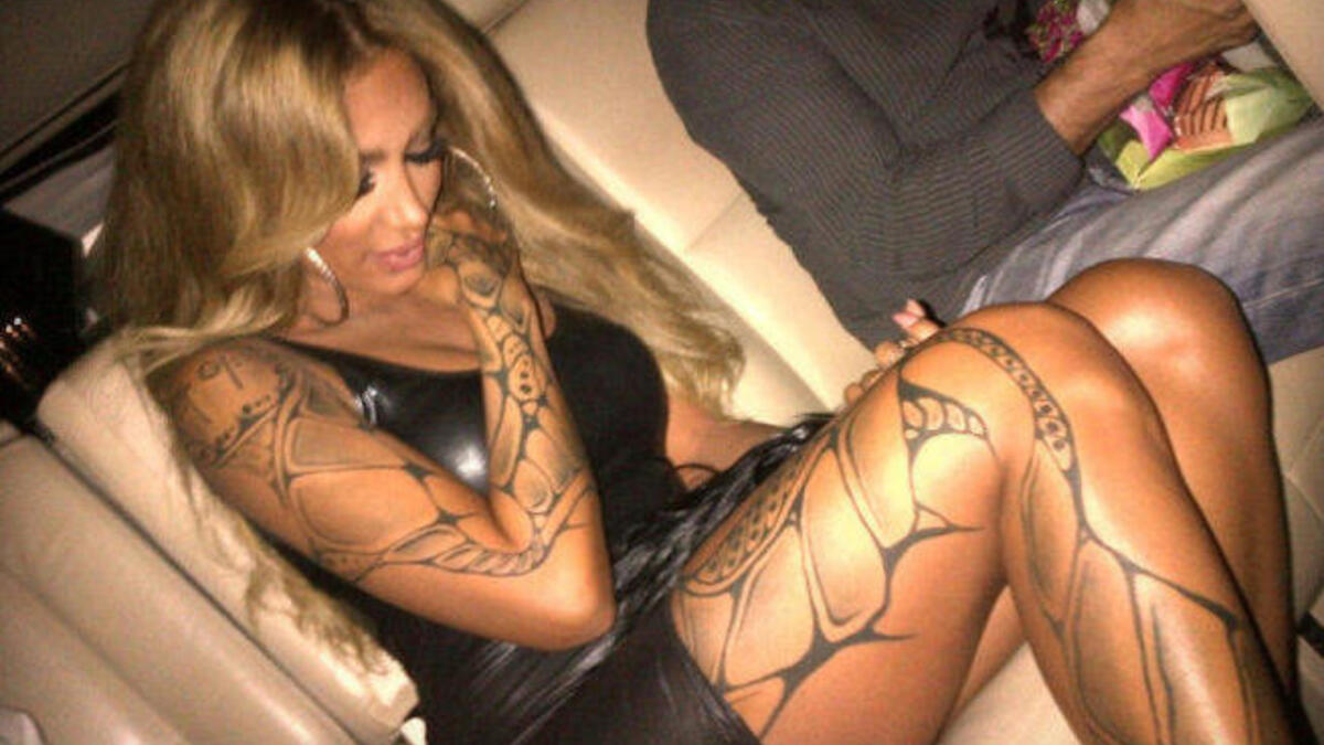 Maya Diab shows off some leg and tattoo