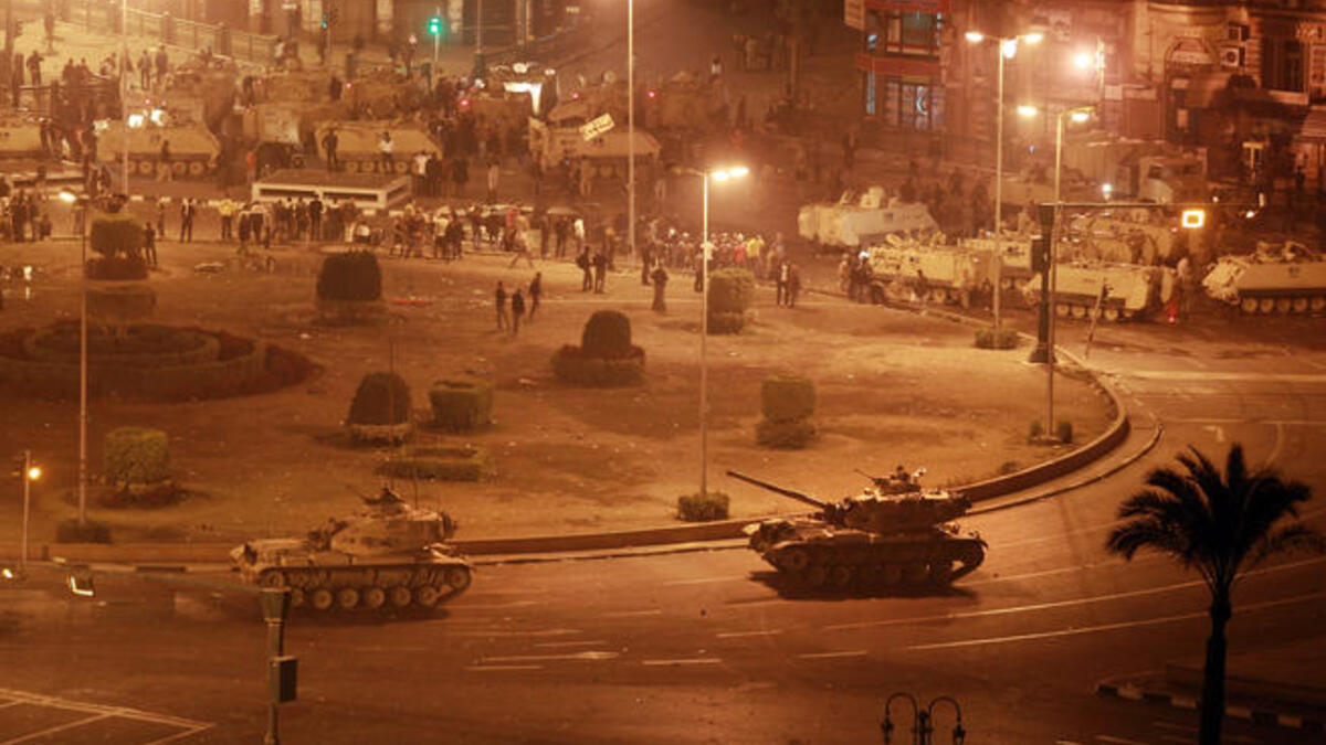Army tanks line up in Tahrir Square.