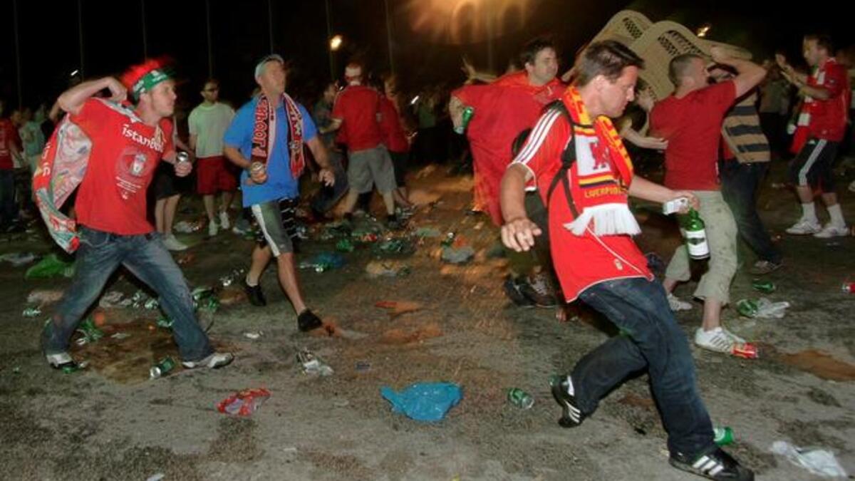 As for football hooliganism popularized by Brits at home and abroad, here shown, fans of Liverpool and AC Milan fight in the streets.Comparisons to be drawn with Liverpool's Hillsborough disaster. This mass crowd crush, killing fans, threw into relief the need for crowd control and better infrastructure to safeguard against such tragedy.
