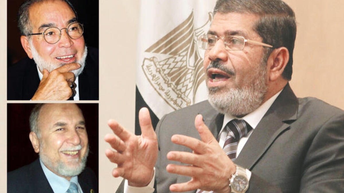Hassan Youssef (top) is supporting Mursi (below); Wagdi Al-Arabi (R)