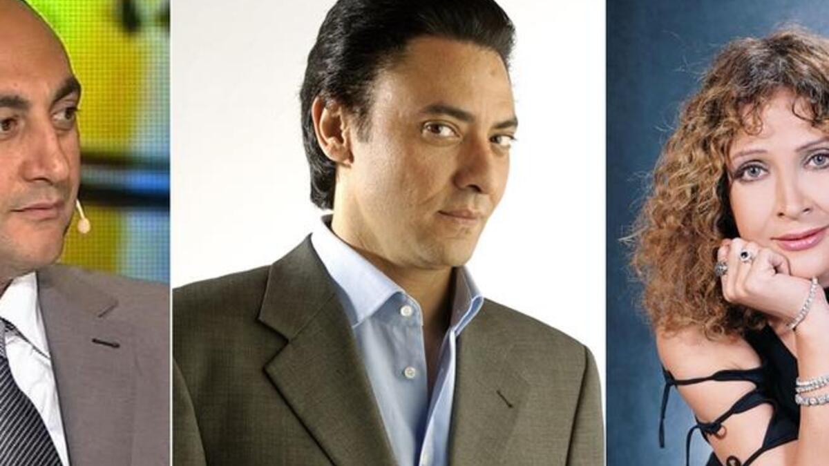 Khaled Ali (L) inspires celebrity voters, Fathy Abdel Wahab and Tayseer Fahmy (R)