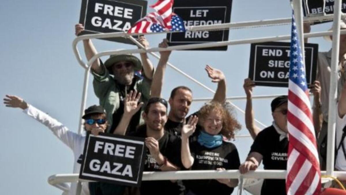 Still smiling, activists after 8/10 boats intercepted 2 weeks on from the sunny start. 2 remaining boats of aspiring
sea-farers, French ship the 'Dignity El Karameh' and the Swedish-Norwegian-Greek 'Juliano' still struggle, docked in the
Greek grip.