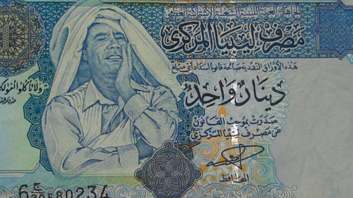 Proud enough to stamp his clownish image on his national exchange. The Qaddafi bill of choice!